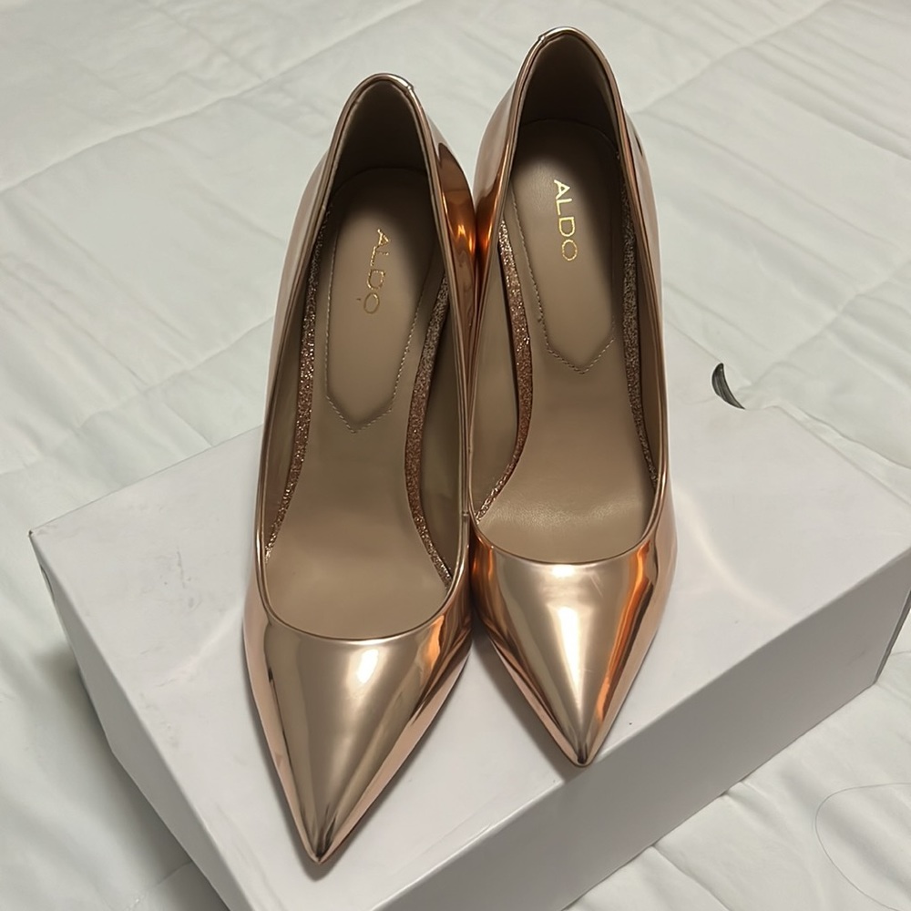 Aldo Stessy gold pointy toe patent pumps
